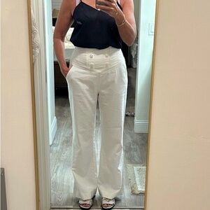 bebe White Boot Cut Pants. Run small 
Fits like size 6
